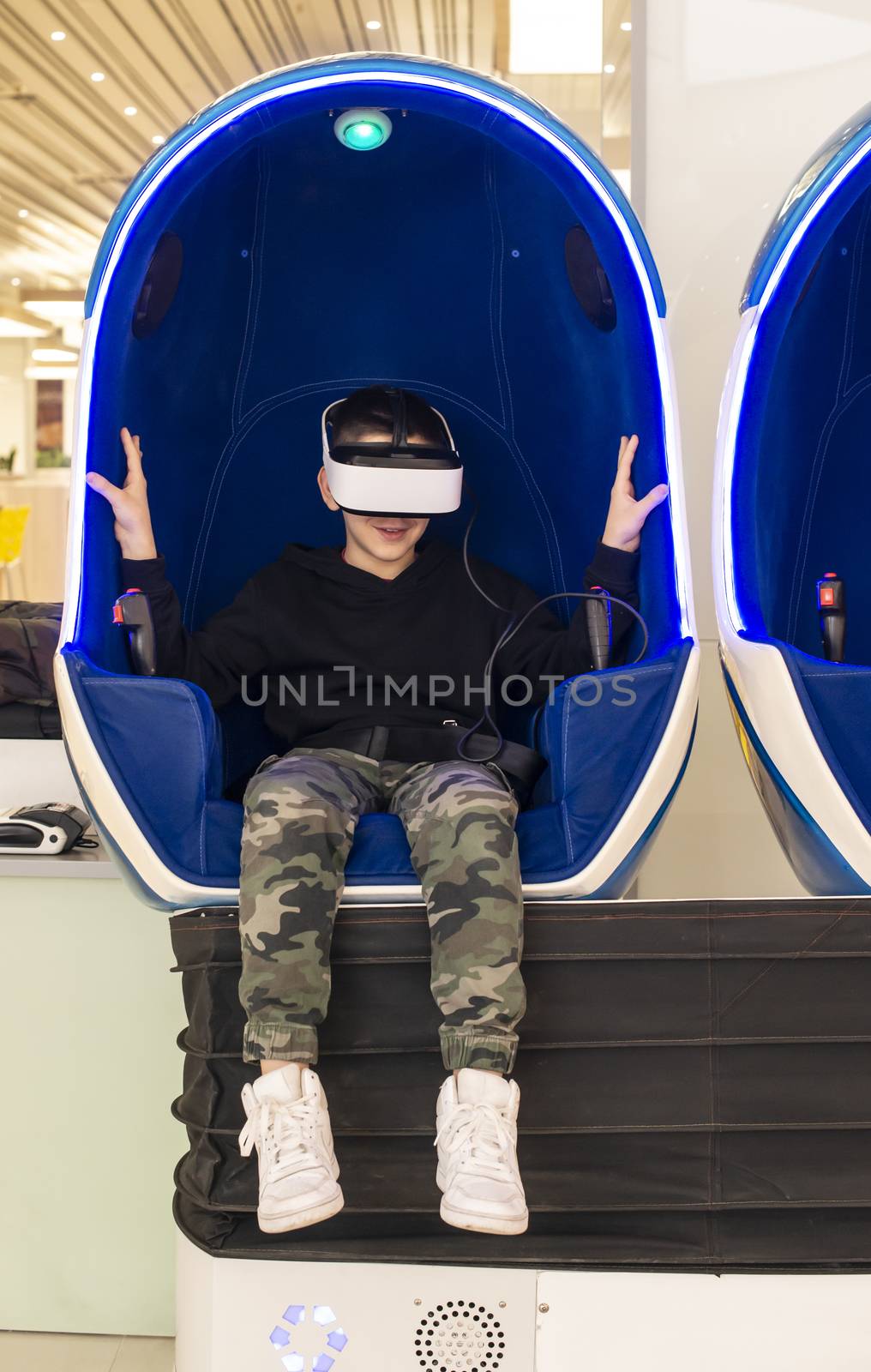 Child watching movie with VR glasses. Special effects. Technolog by deyan_georgiev