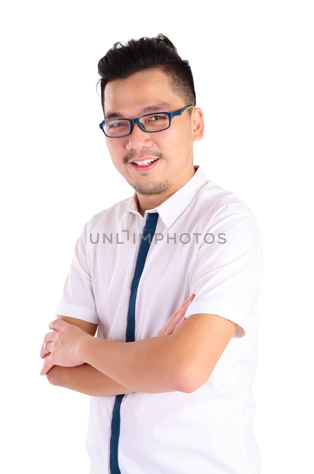 Confident Asian man crossed arms over white background