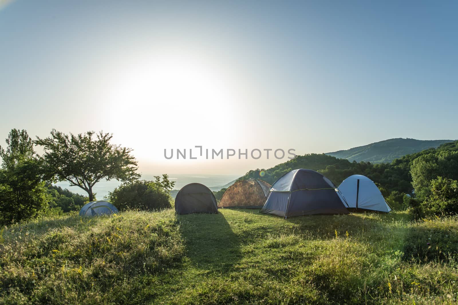 Many tents in the mountain.. Outdoor concept. Sunshine morning in the forest.