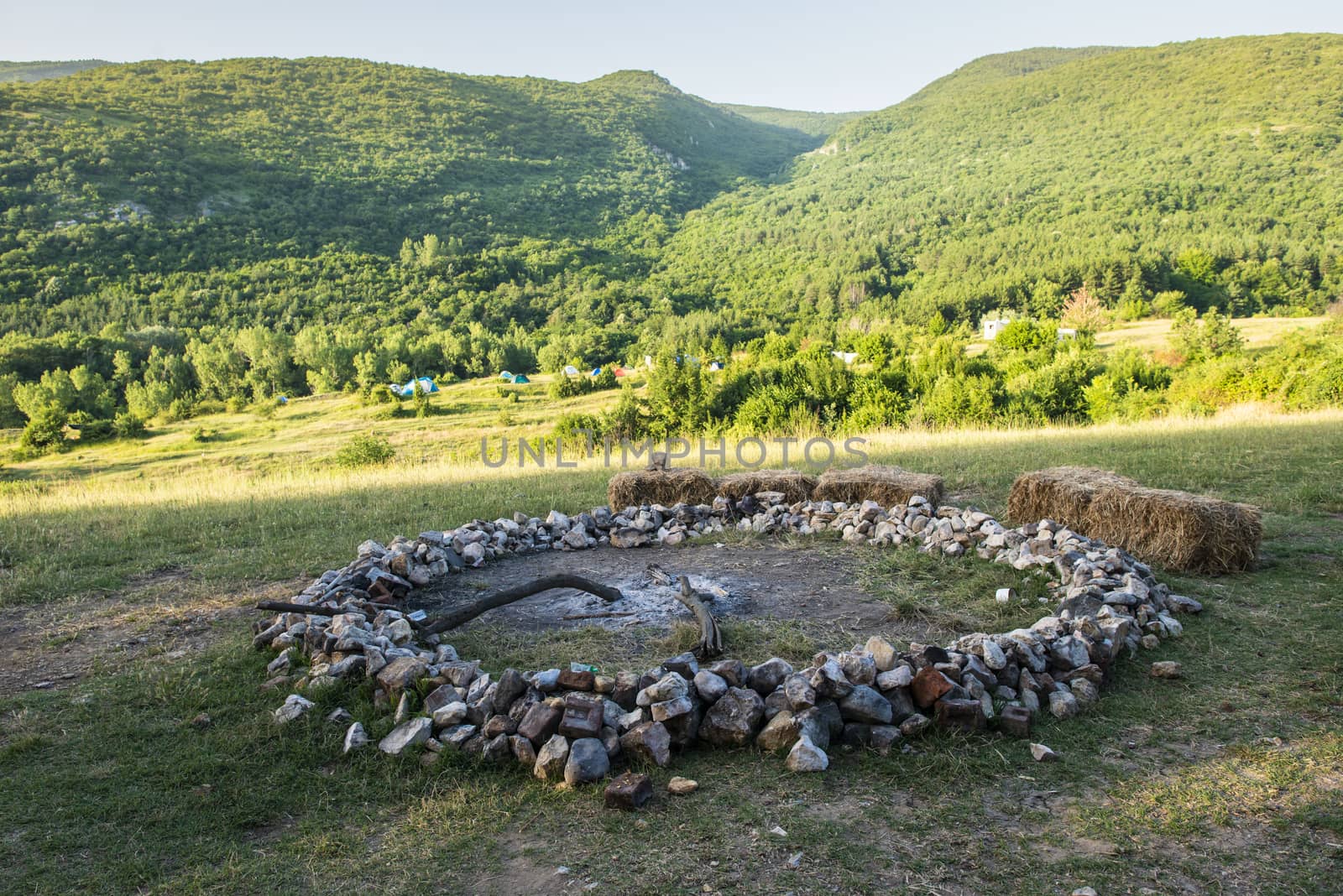 Big fireplace in the mountain. Sunny day. Outdoor concept.