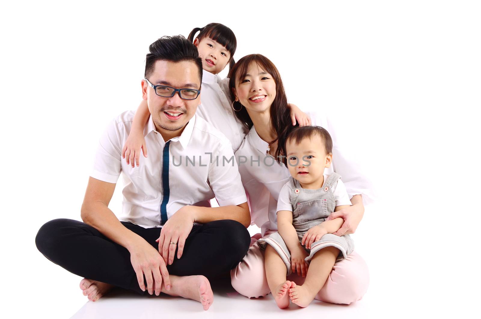 Indoor portrait of a happy asian family
