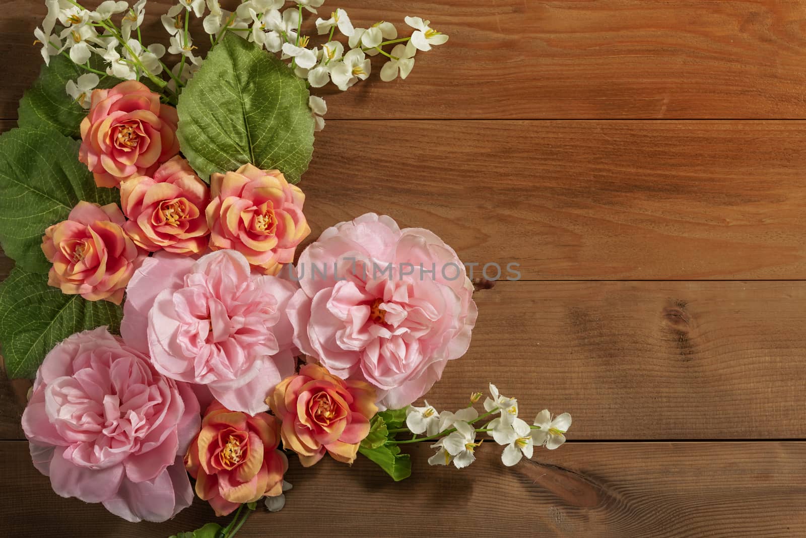 top view beautiful flowers with leaves  by rakratchada