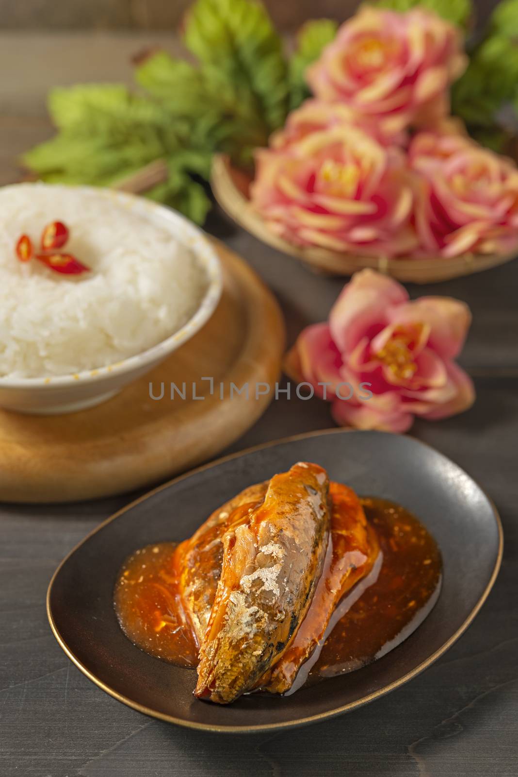 sardines fish in tomato sauce served with steamed rice