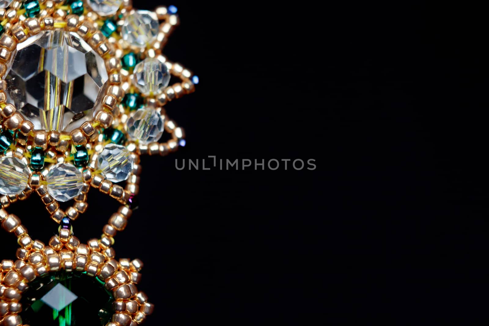 handmade jewelry made of beads in macro. earrings from white beads. earrings from stones by yulaphotographer