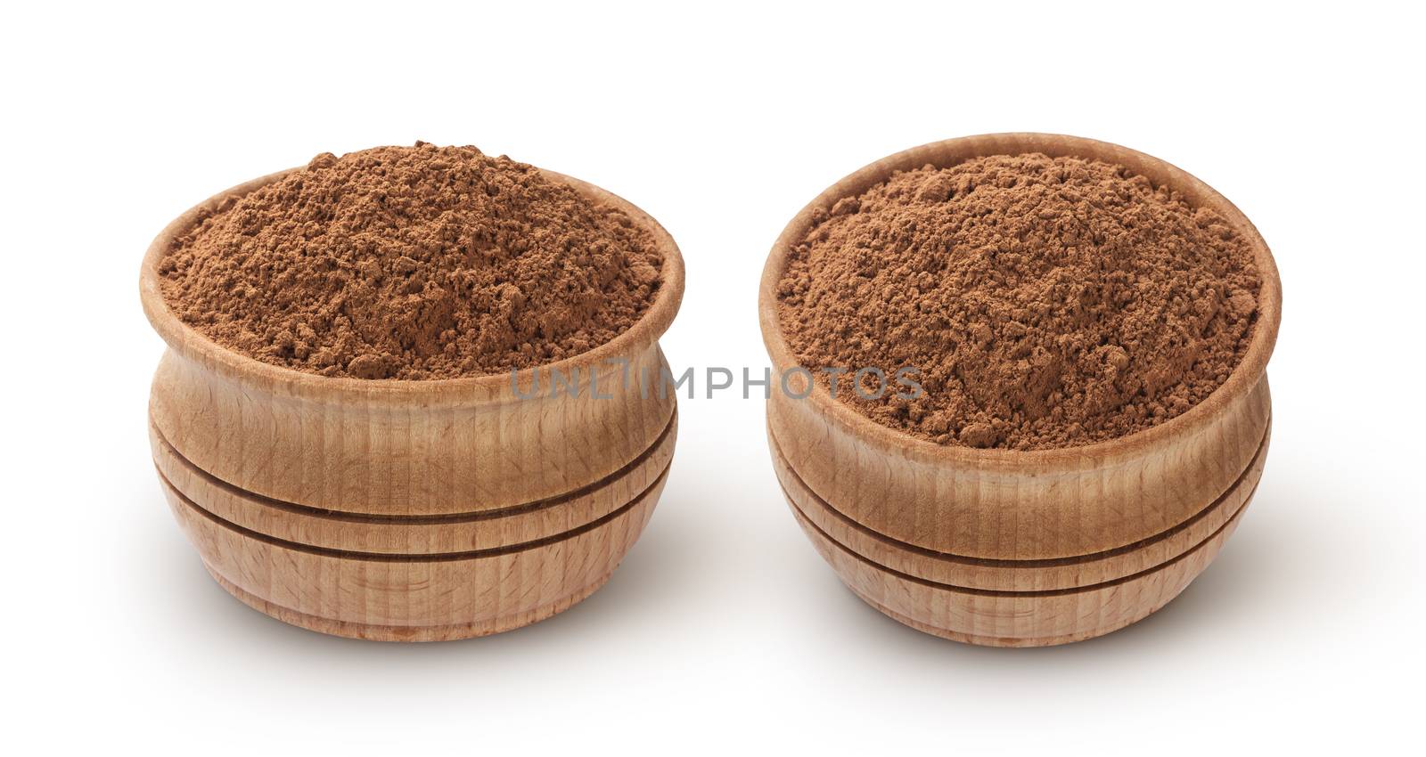 Cocoa powder in wooden bowl isolated on white background