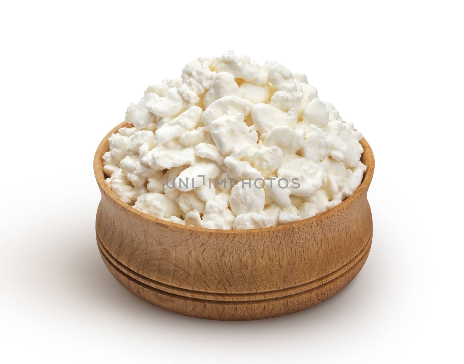 Cottage cheese in wooden bowl isolated on white background by xamtiw