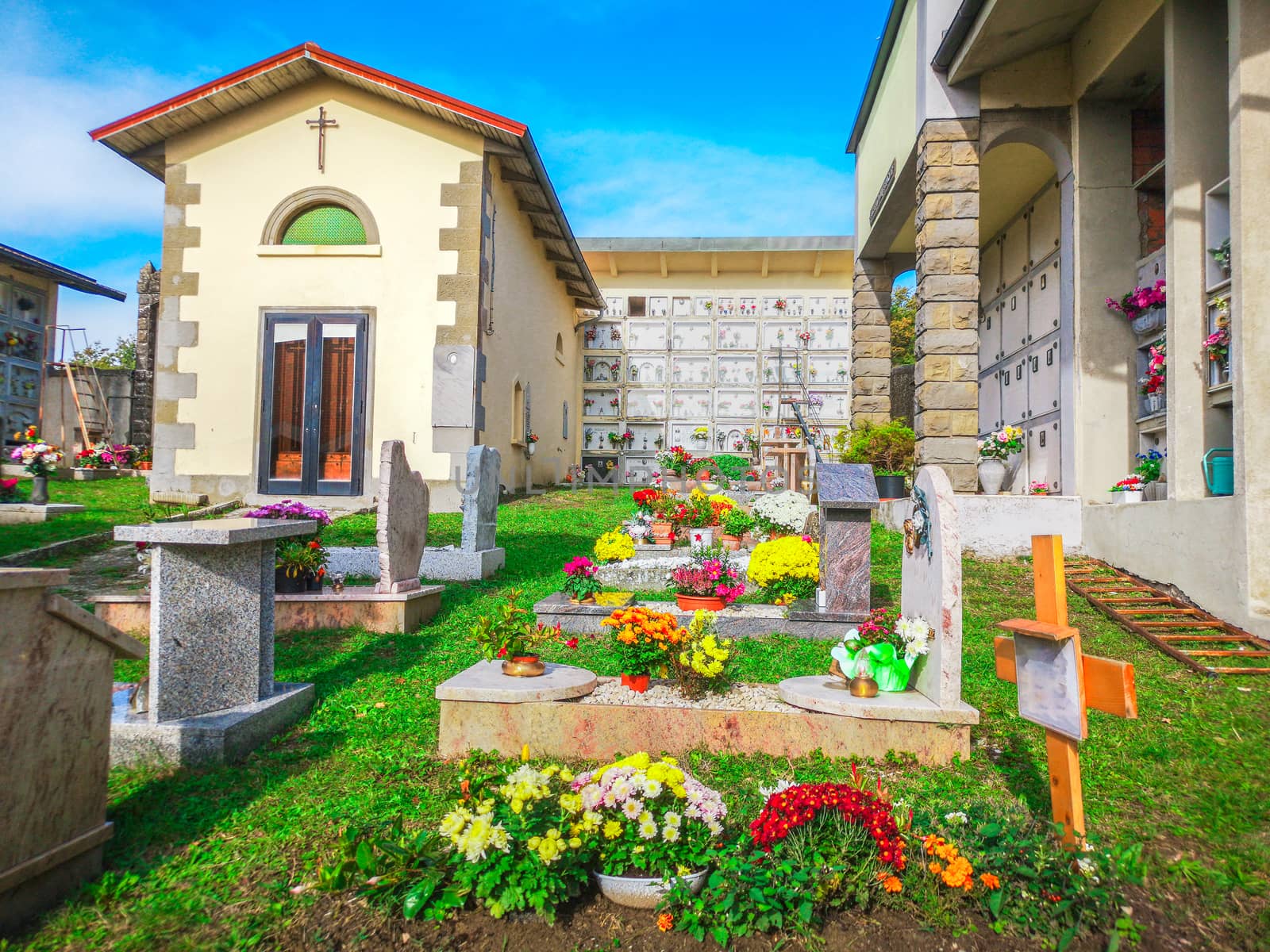 colorful cemetery small country side by LucaLorenzelli