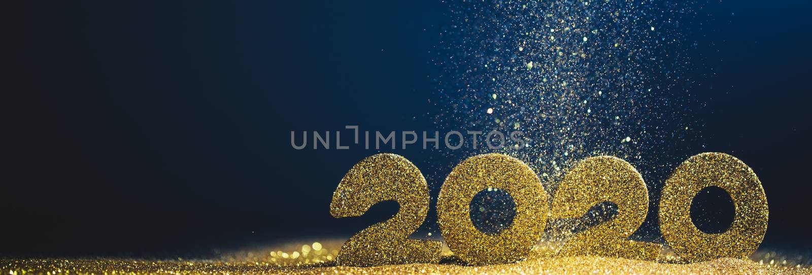 2020 New Year luxury glitter design concept numbers in golden glitters on blue background