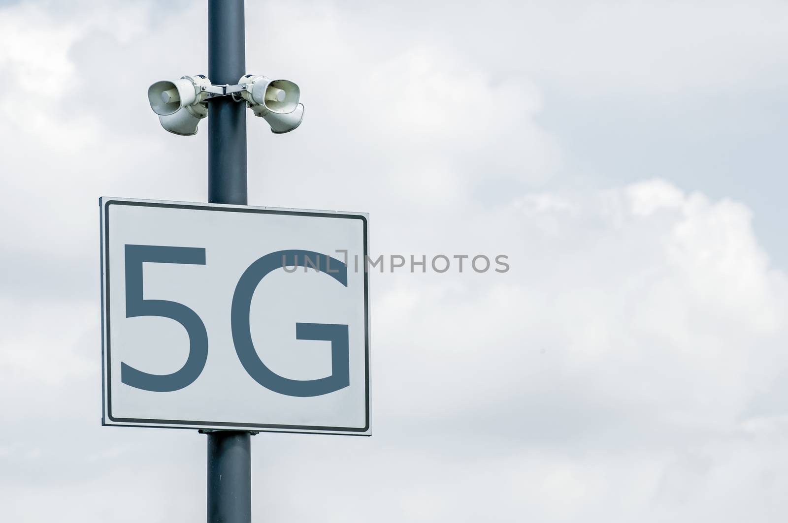 5G concept in the city. Many wireless symbols on the top of the  by deyan_georgiev