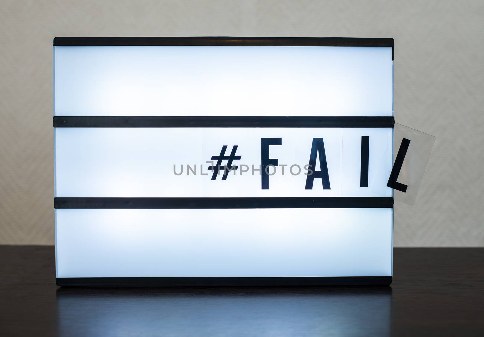 Text Fail and hashtag. Concept for error and falling. Illuminated message.