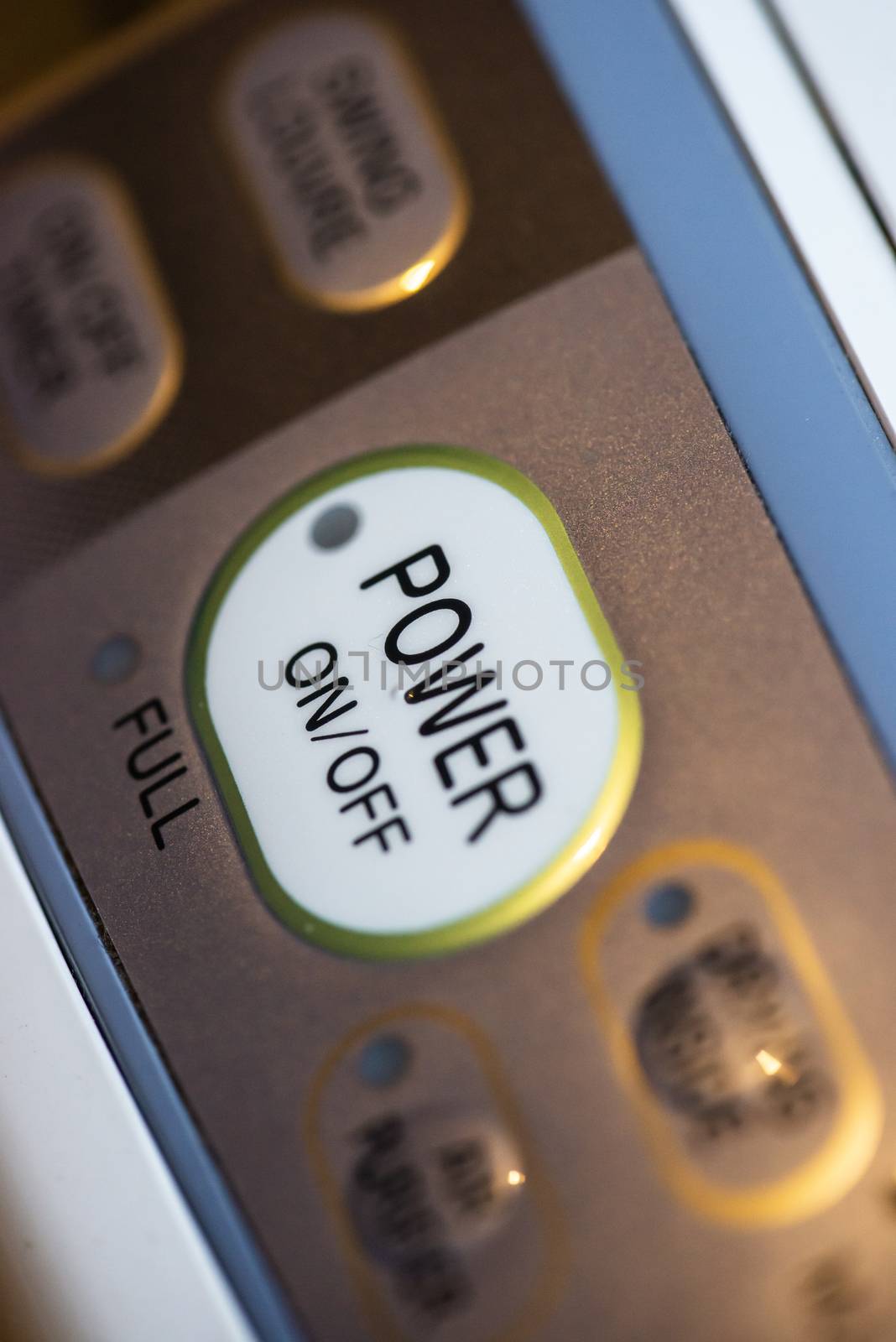 Power on button on electrical device. Close up button. Switch on/off conception.