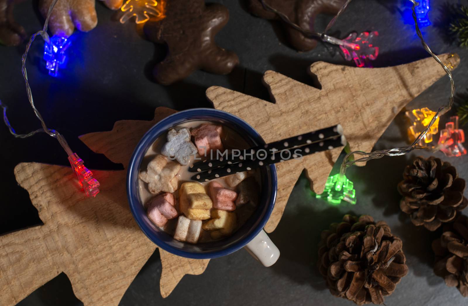 Marshmallow and milk on christmas table. Tree shape