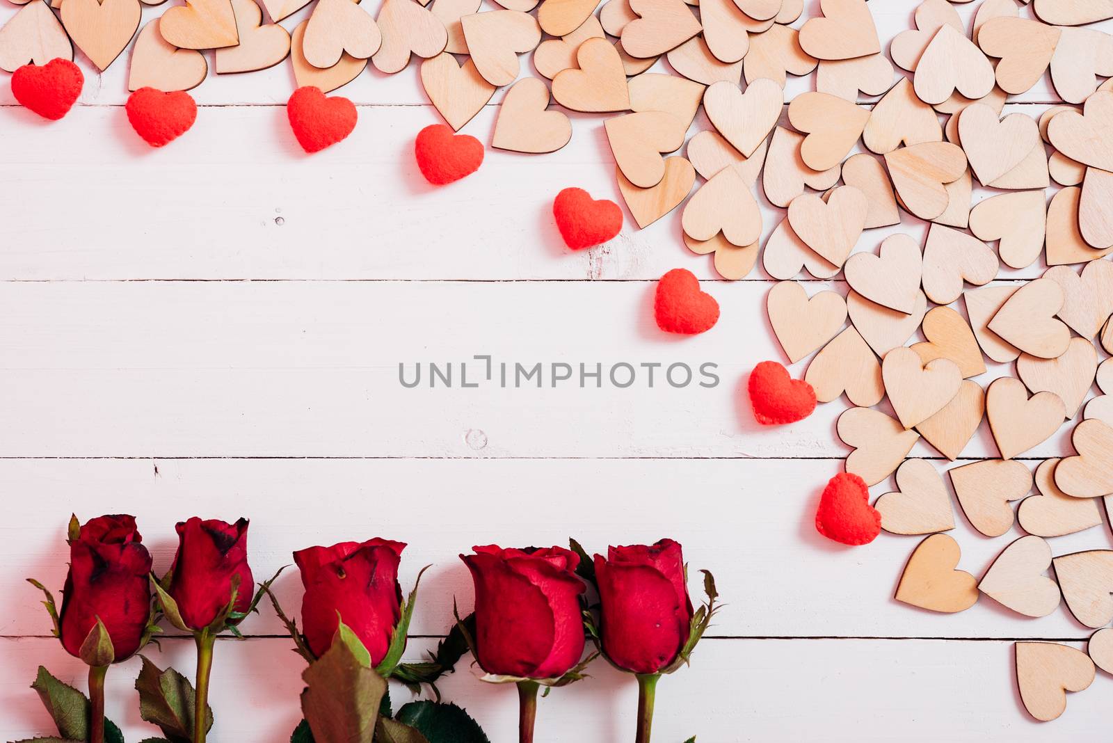 Wood hearts on white wooden background with copy space, valentine day concept