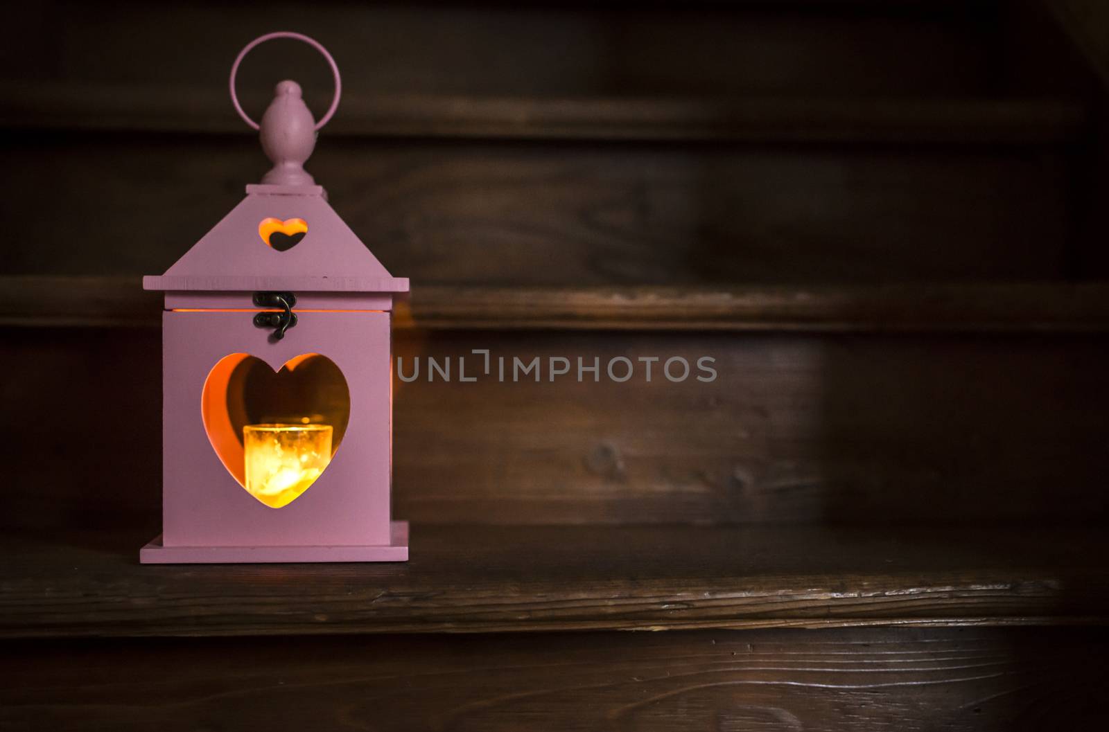 Heart shaped lantern and candle 