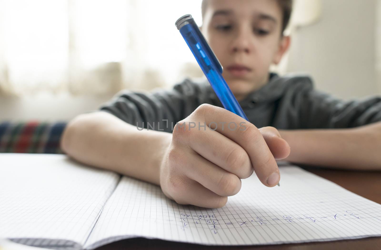 Boy do his homework by deyan_georgiev