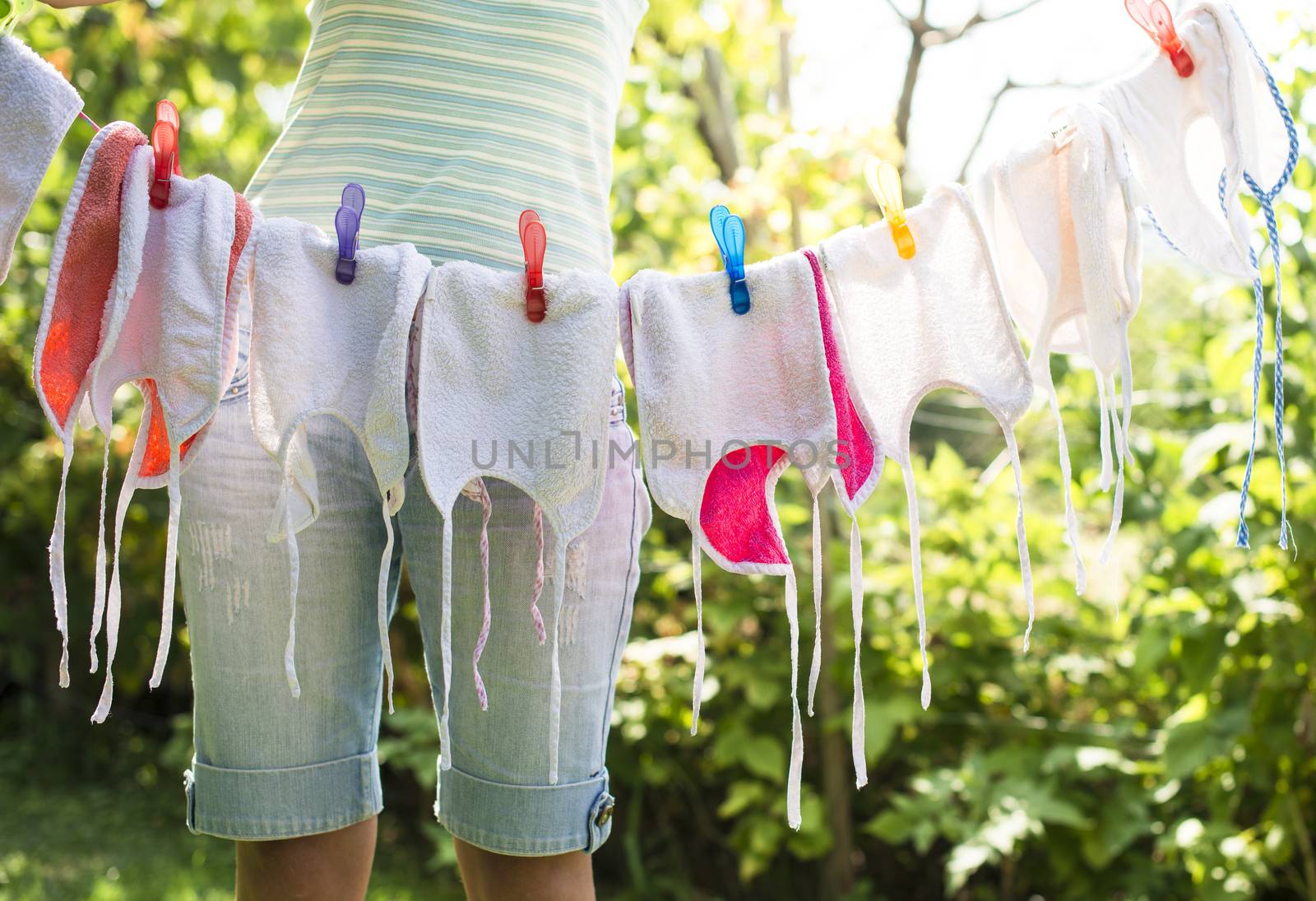 Baby bibs on laundry