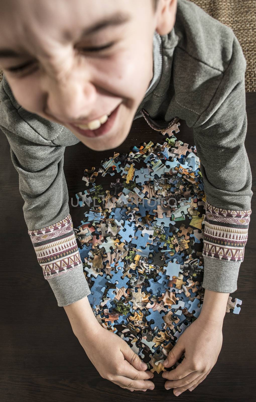 Child and puzzle. 
