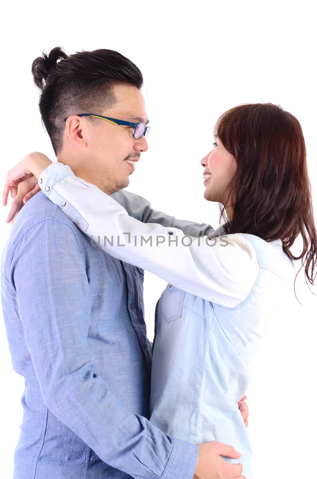 indoor portrait of asian couple isolated over white background