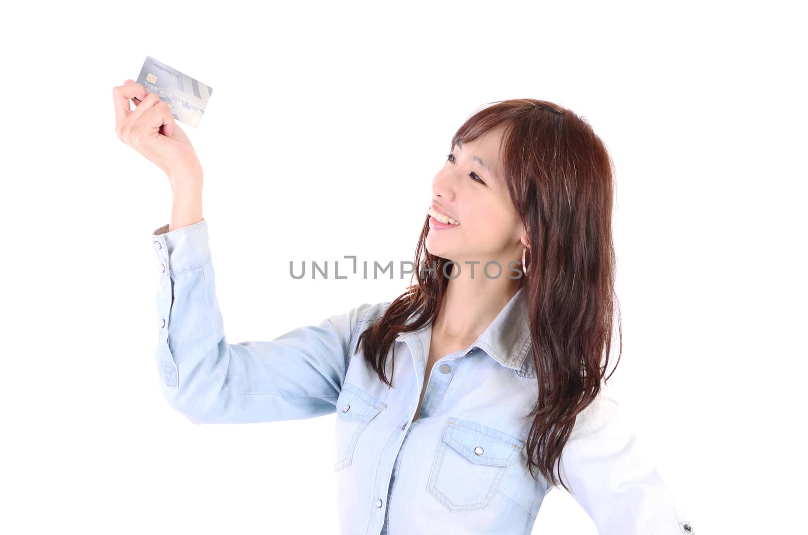 smiling asian woman holding credit card