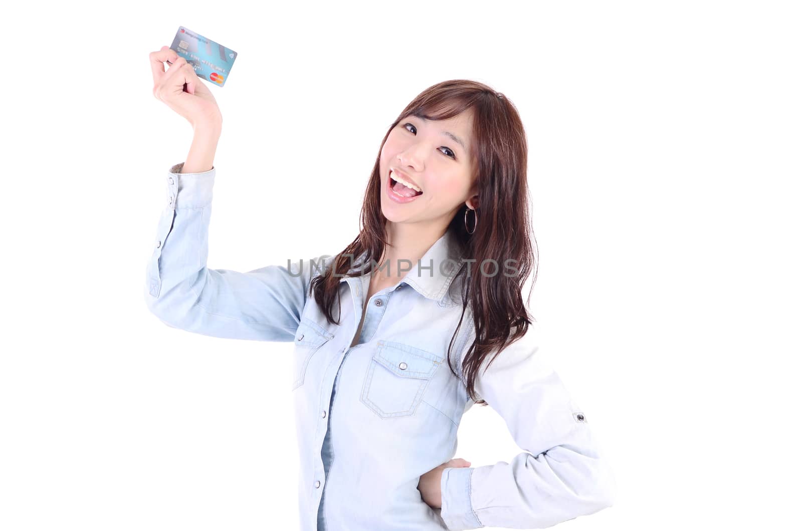 smiling asian woman holding credit card