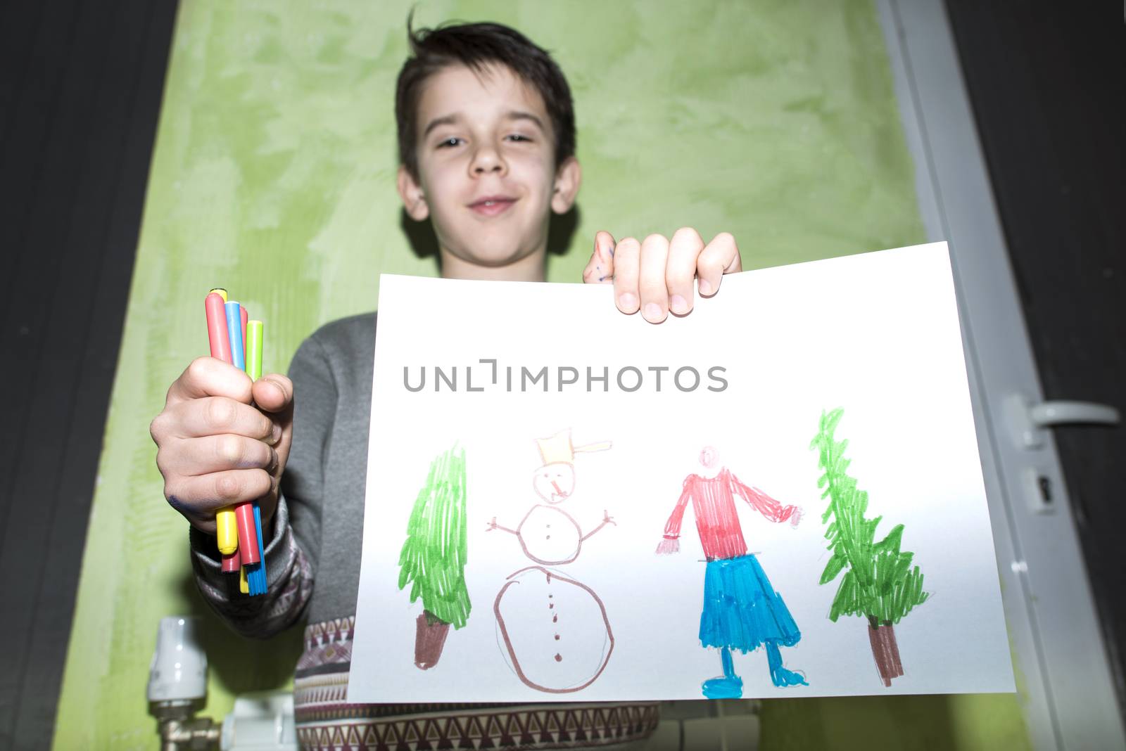 Child shows picture. Direct on camera flash