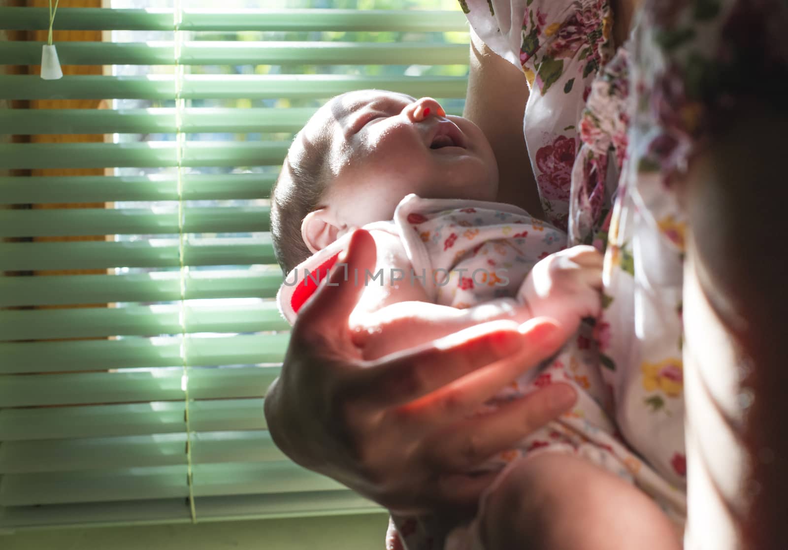 Baby and mom to the window by deyan_georgiev