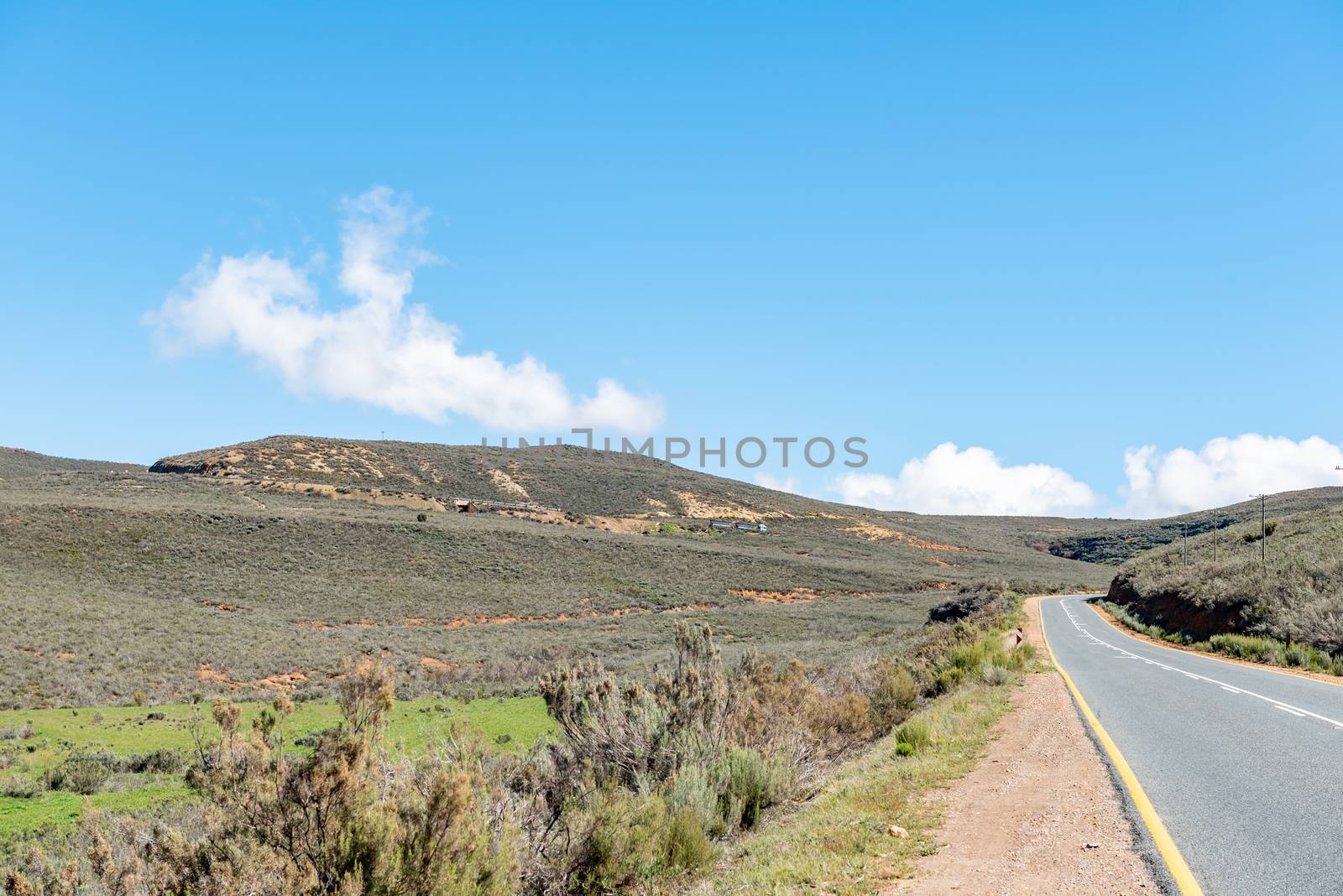 The Hottentotskloof Pass on road R46 near Ceres in the Western Cape Province. A trucks is visible