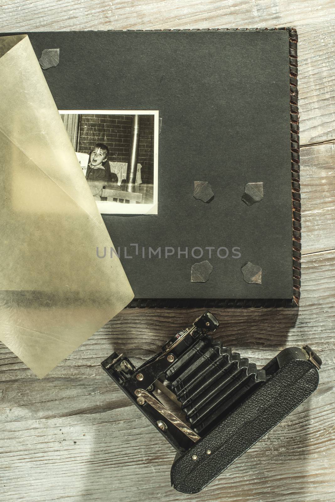 Vintage photo camera and album by deyan_georgiev