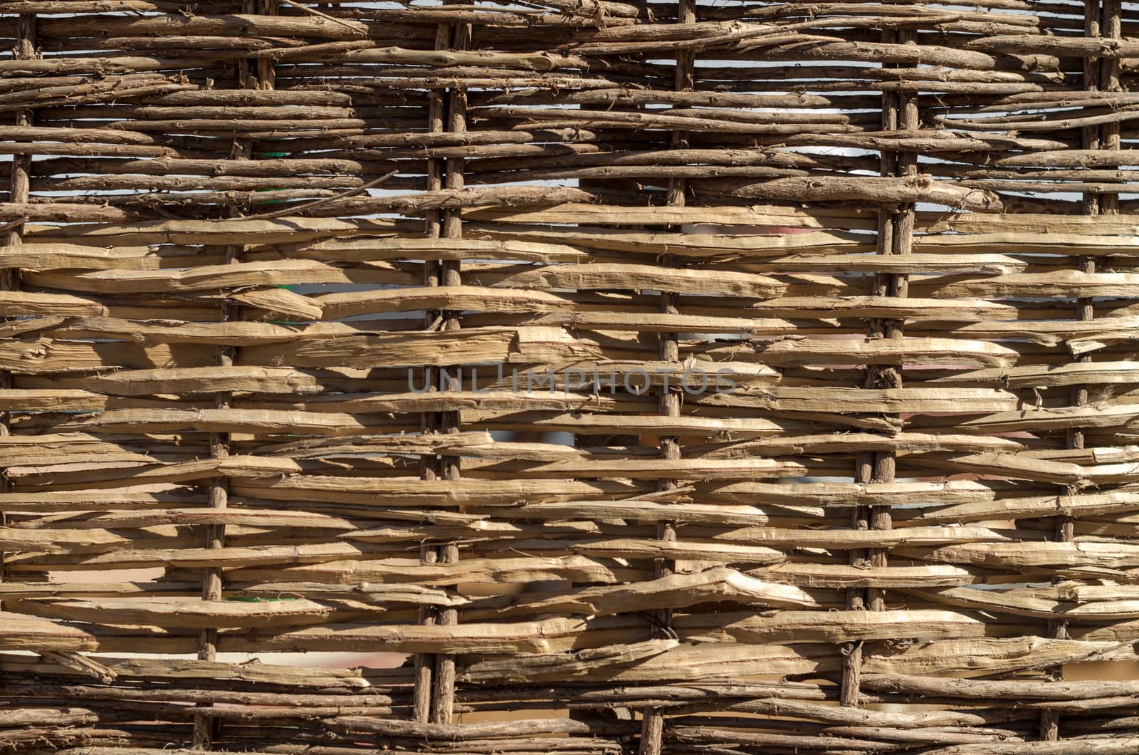 texture of wooden wicker fence close up