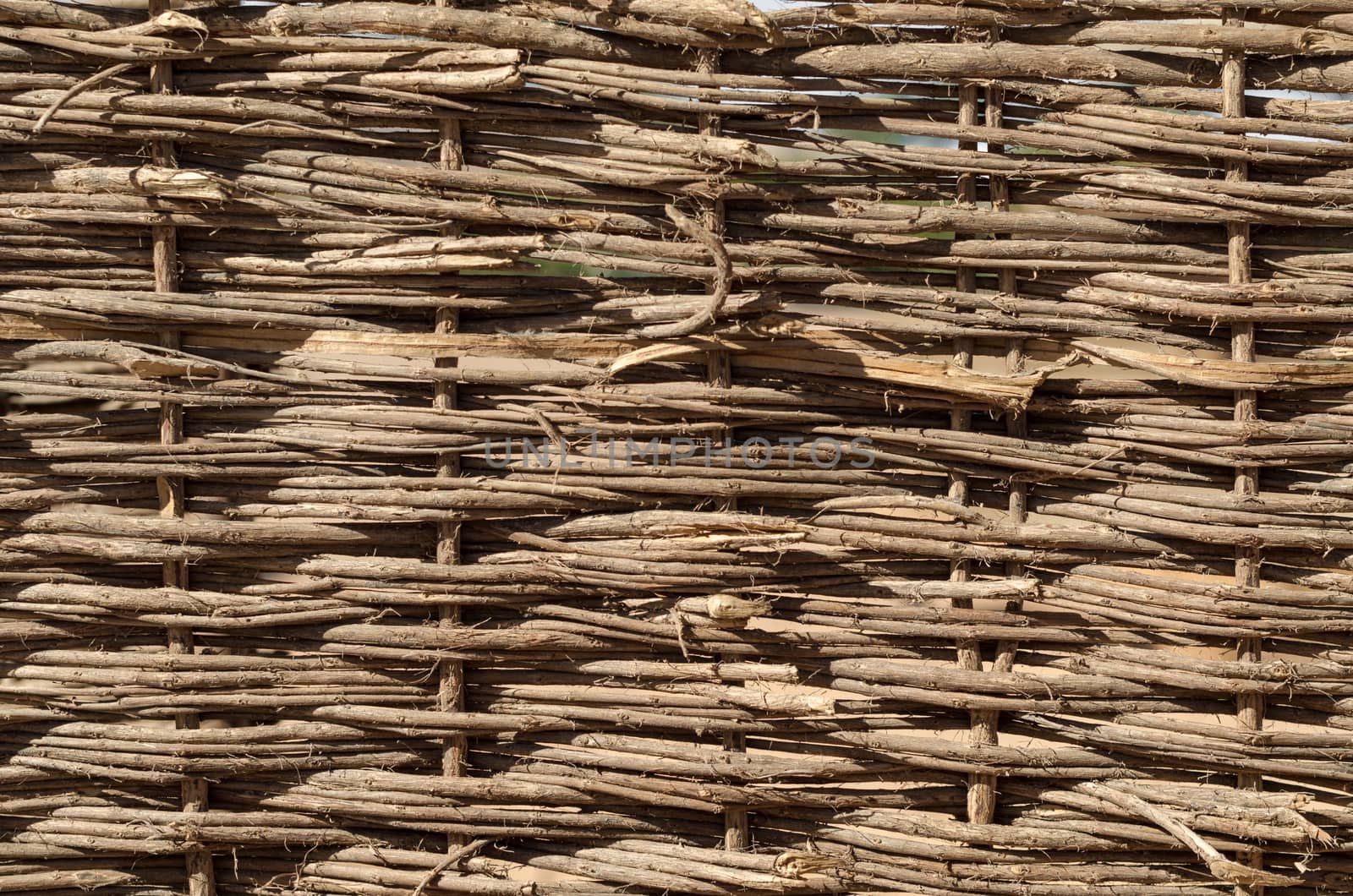texture of wooden wicker fence close up