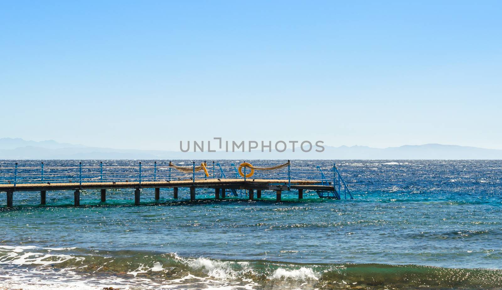 platform with orange lifeline in the Red Sea in Egypt Dahab