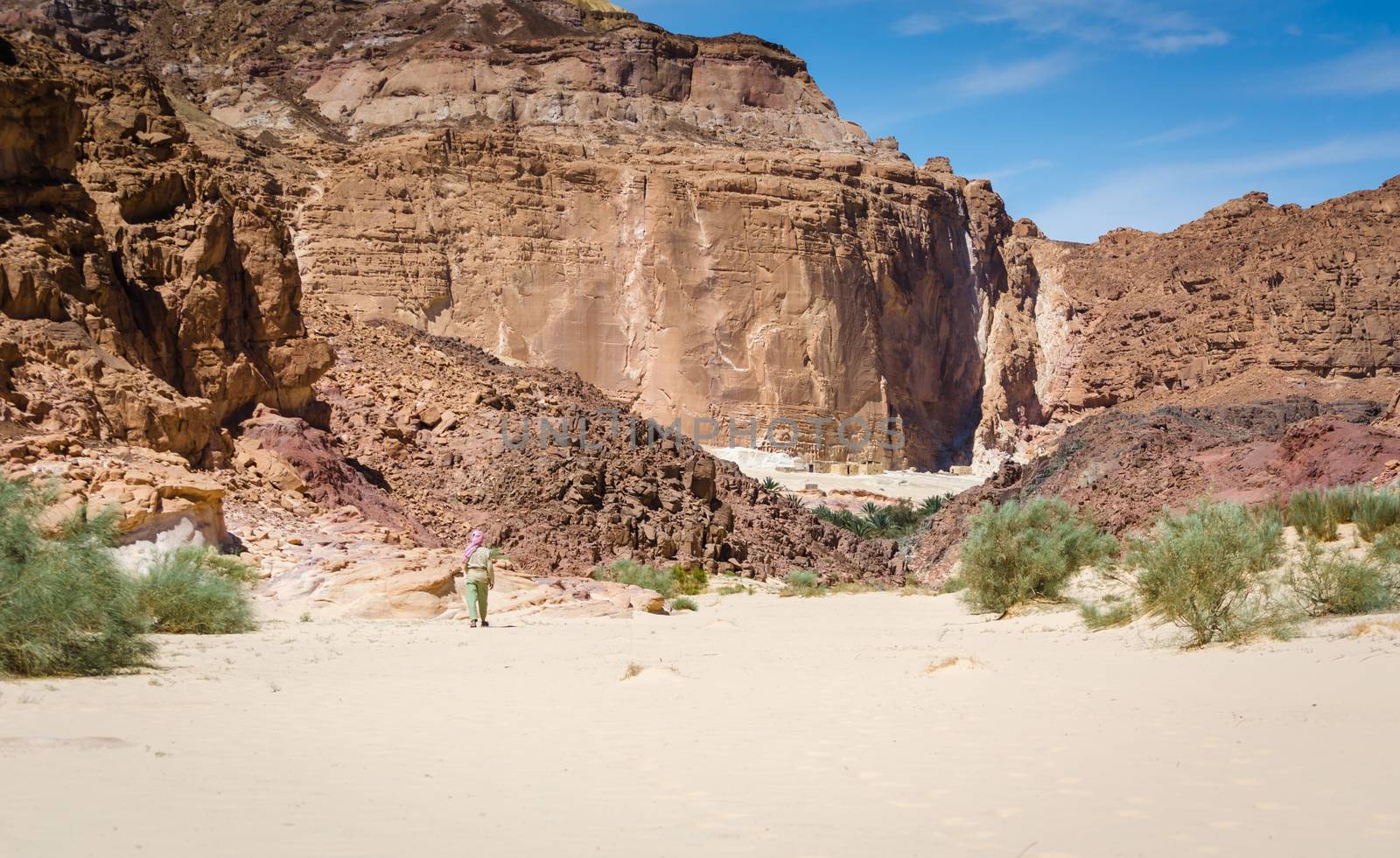 Bedouin goes to a village in the desert amid high rocky mountains in Egypt Dahab