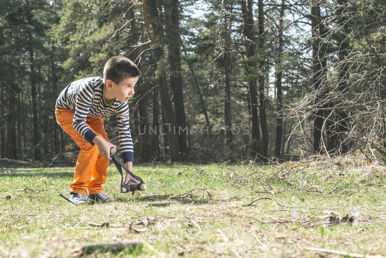 Child play with sling toy by deyan_georgiev