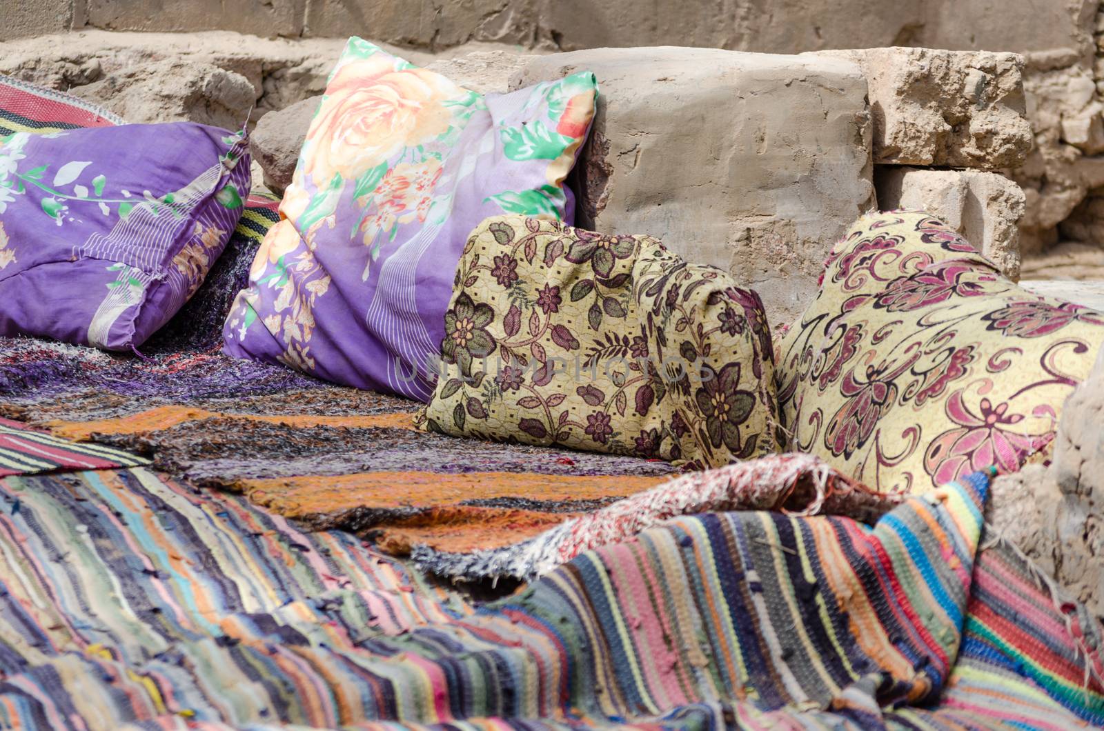 colored carpets and pillows in a Bedouin village in Egypt Dahab
