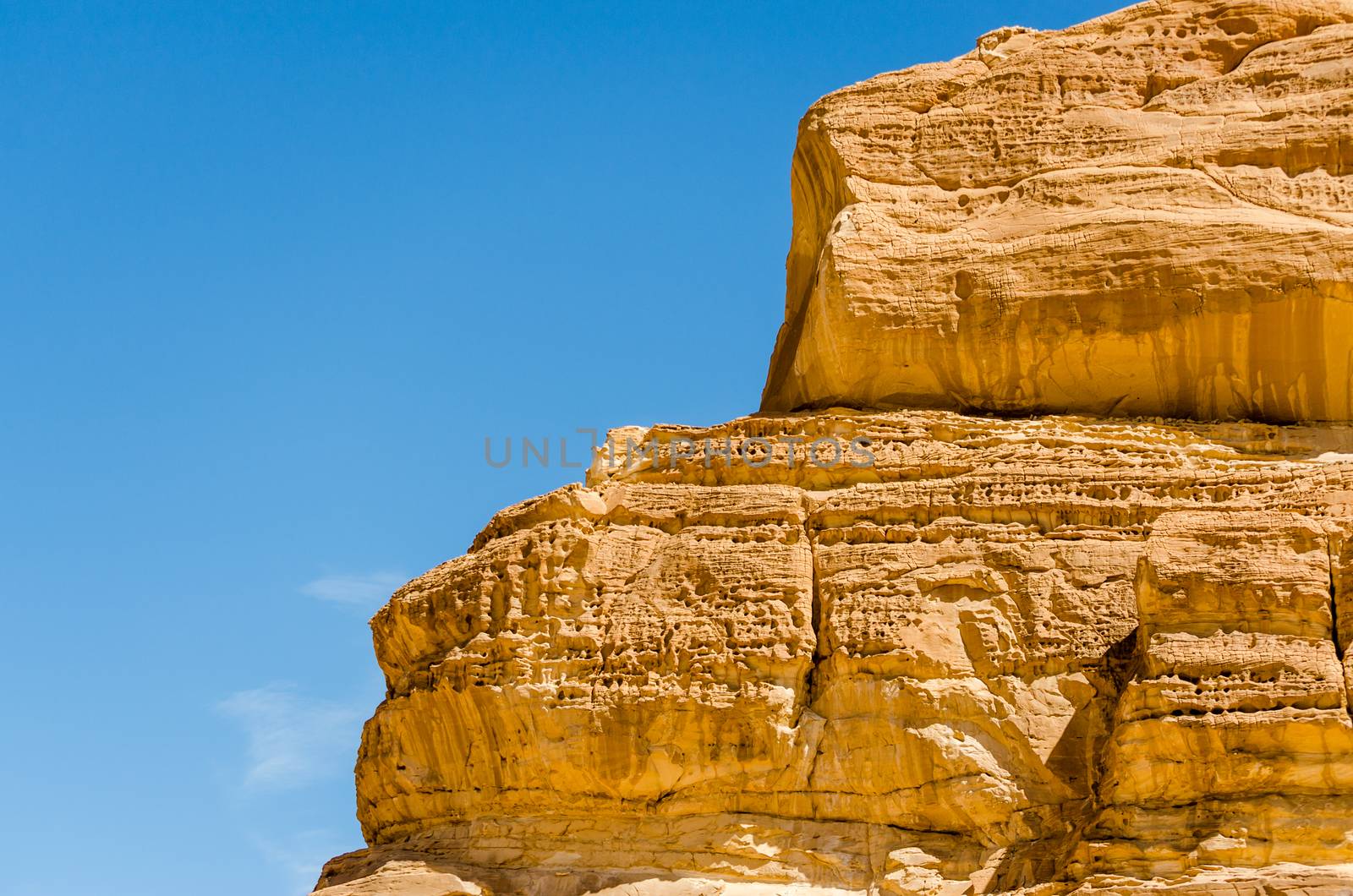 high mountains against the blue sky