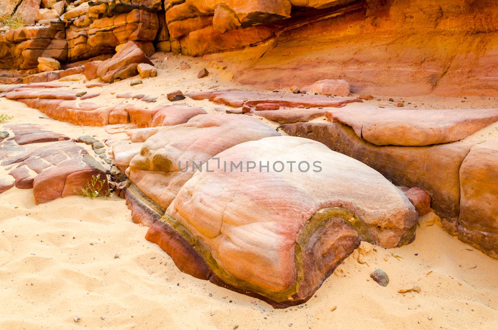 big stones and rocks in a colored canyon