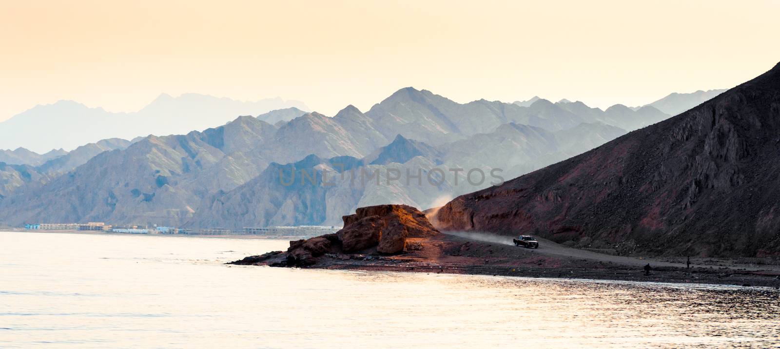 car rides on a road in the mountains near the shores of the Red Sea in Egypt