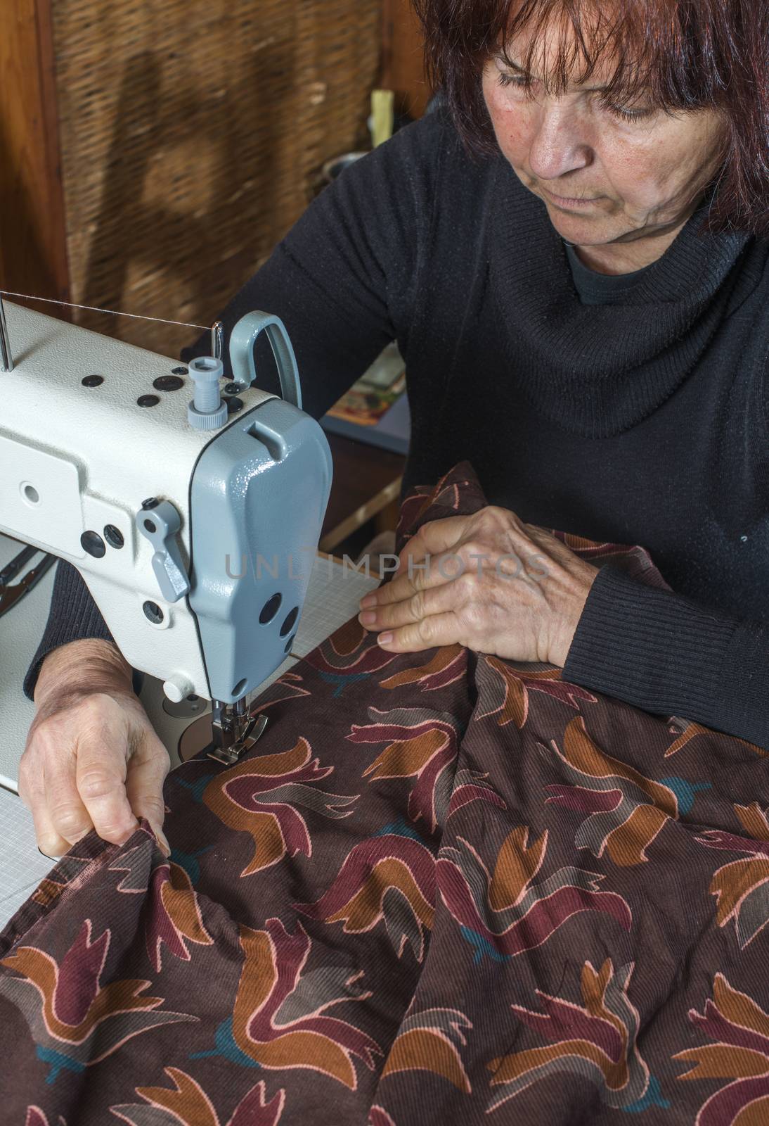 Woman and sewing machine by deyan_georgiev