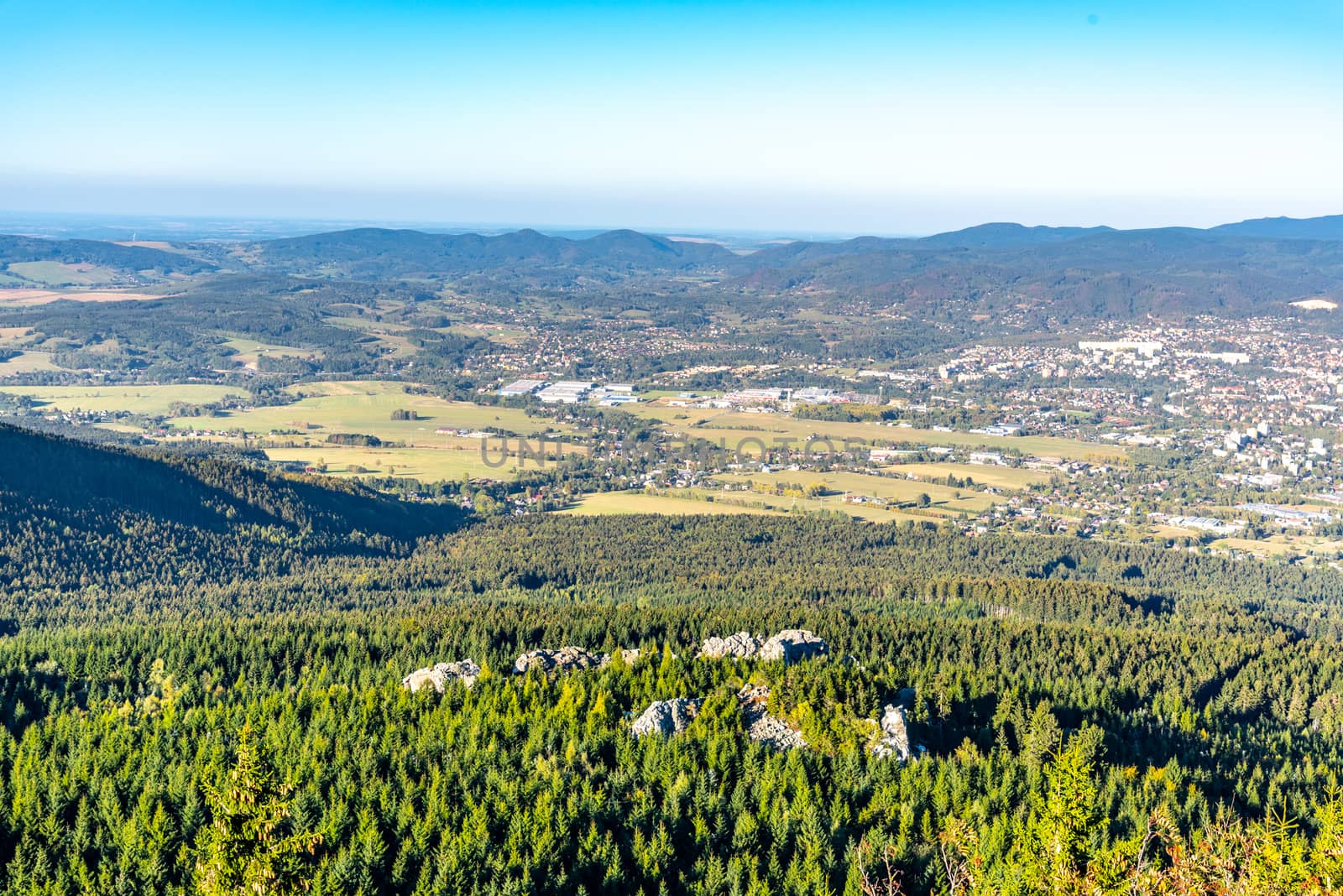 Aerial view of Liberec city and Jizera Mountains from Jested Mountain on sunny summer evening. Czech Republic by pyty