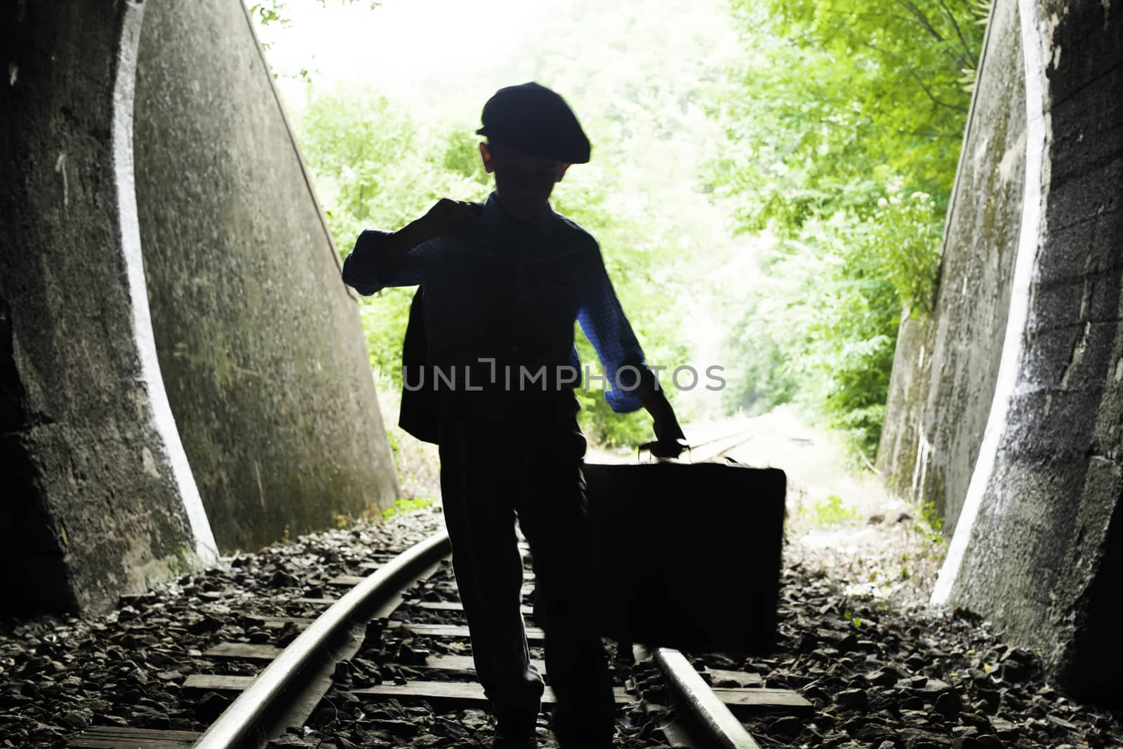 Child walking on railway road by deyan_georgiev