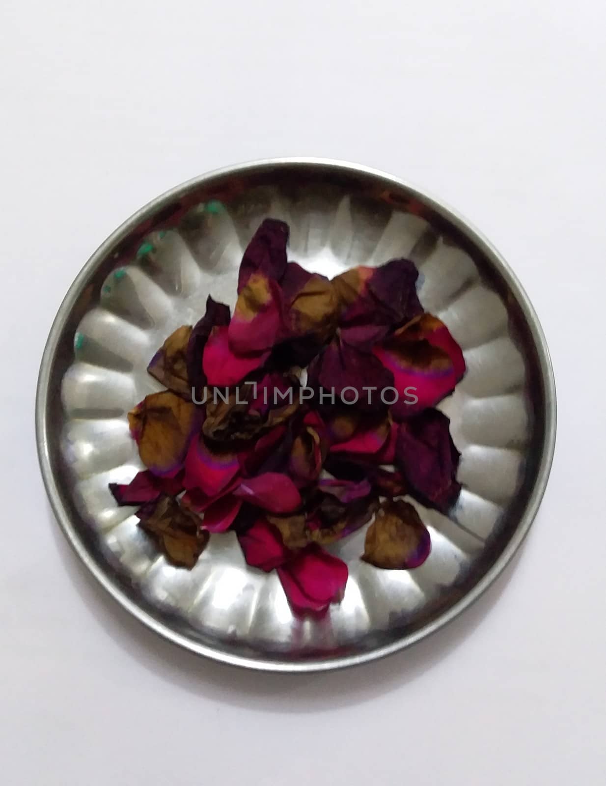 rose petals on a steel plate by gswagh71