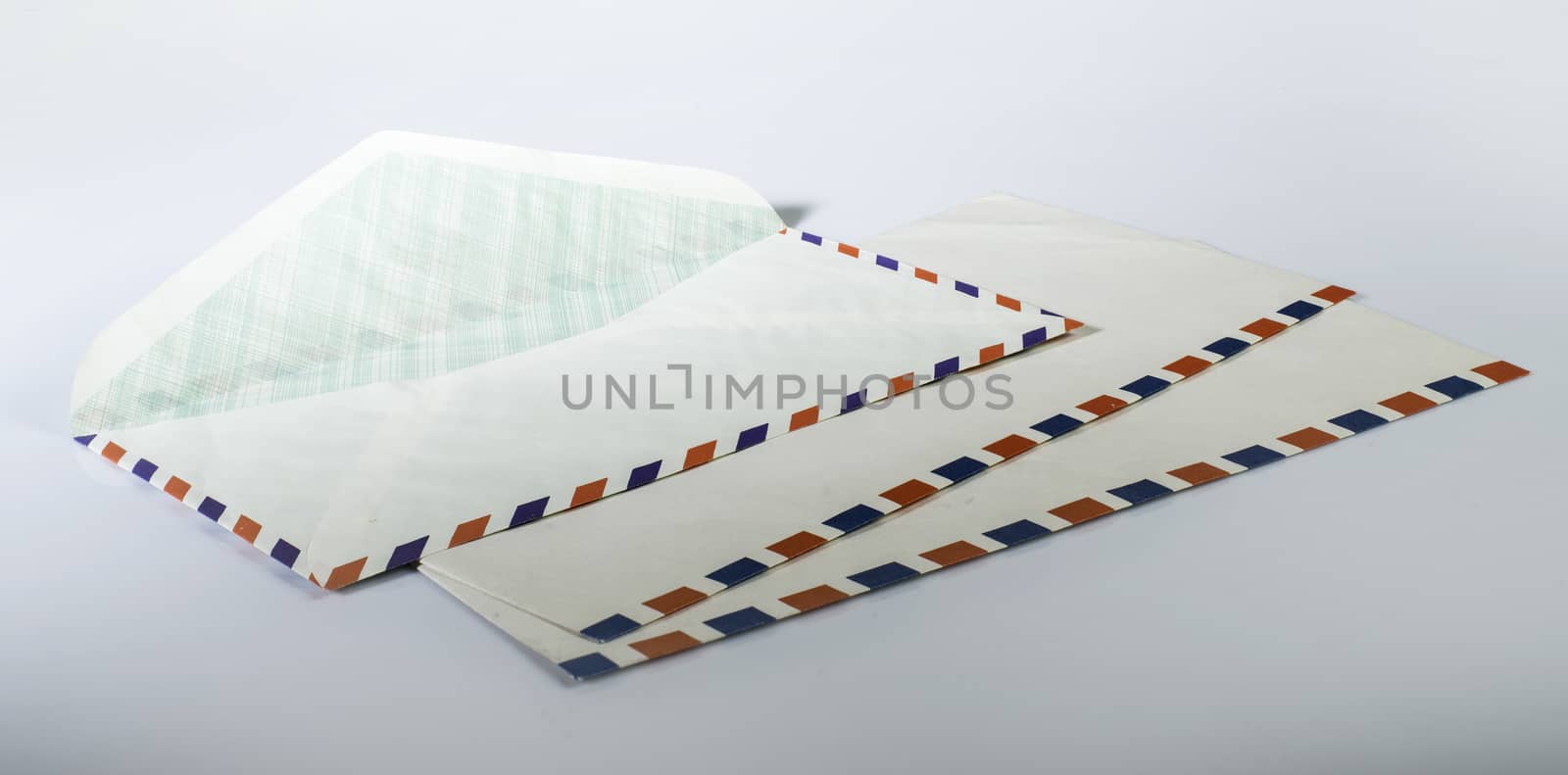 Vintage envelope on white background. Red and blue lines