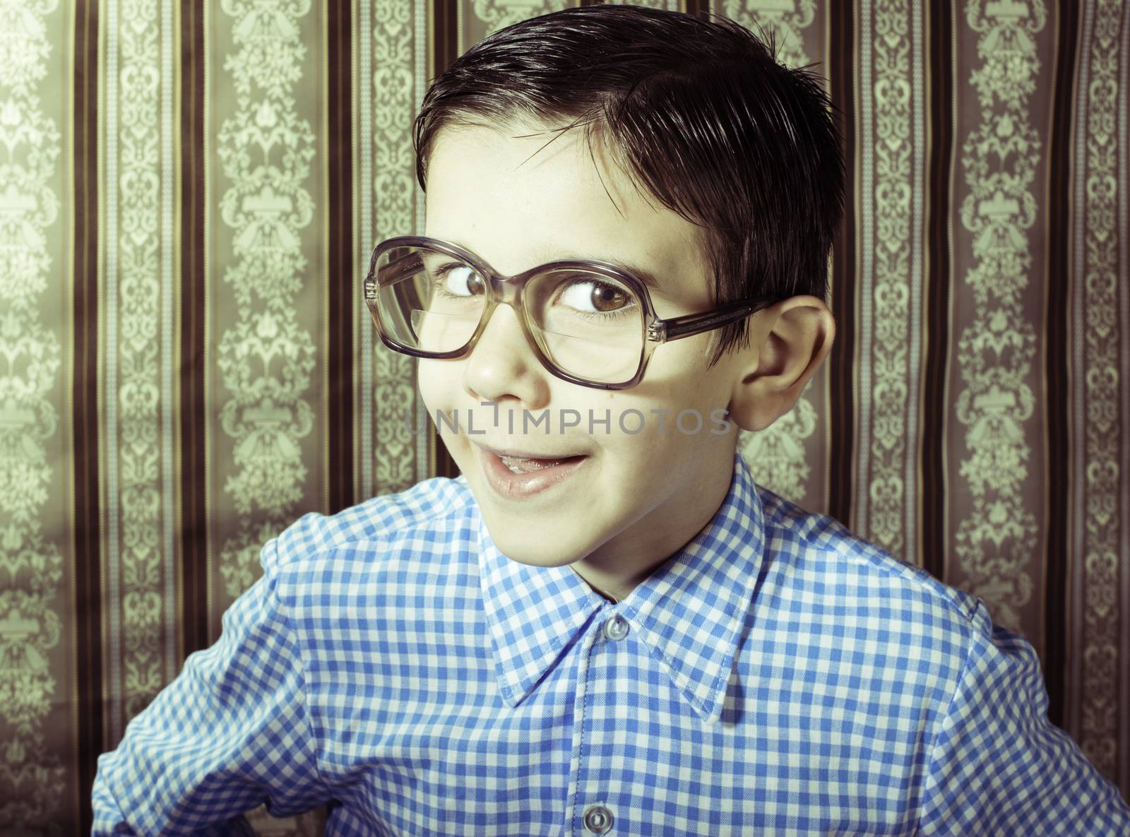 Smiling child with glasses in vintage clothes by deyan_georgiev