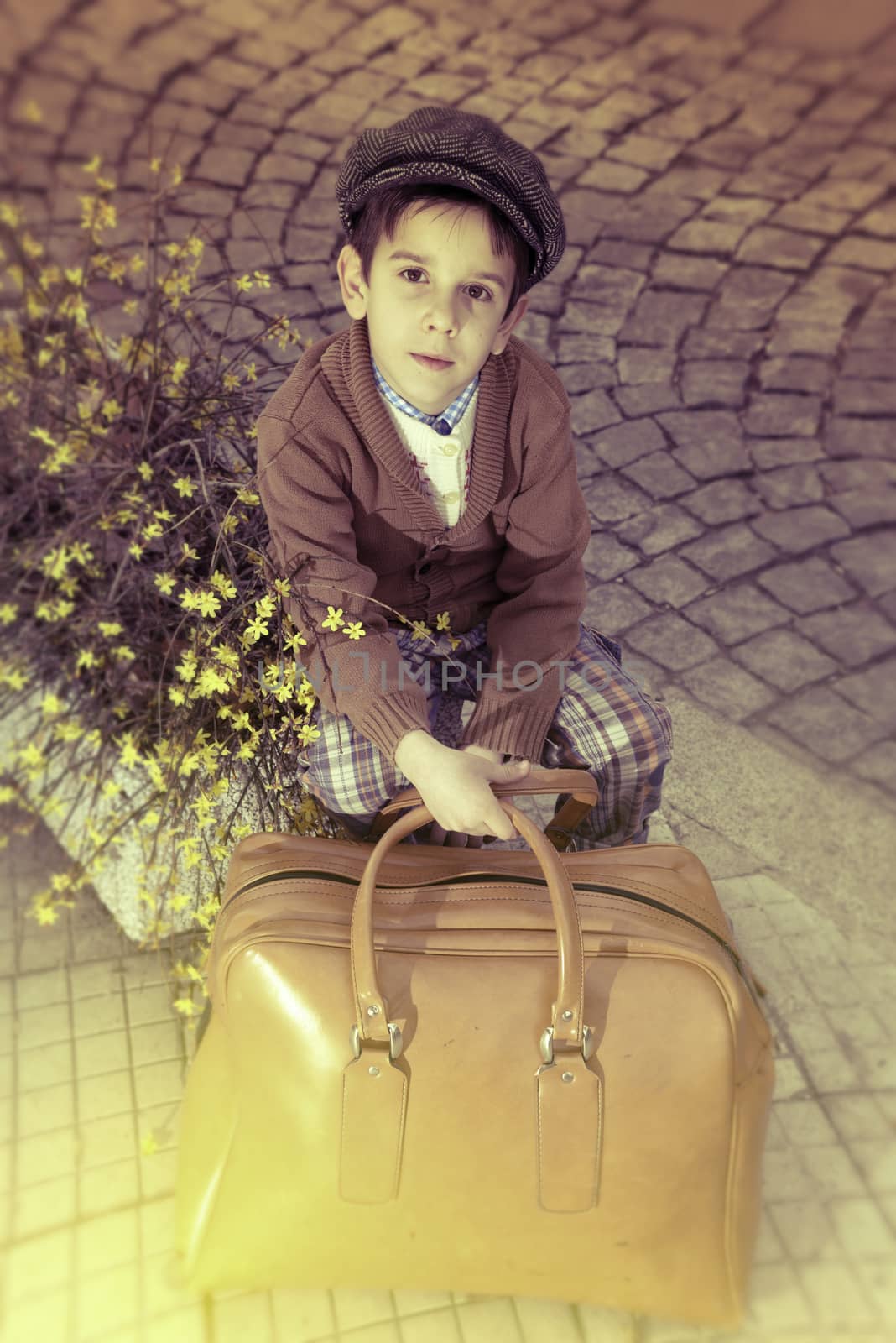 Child on a road with vintage bag by deyan_georgiev