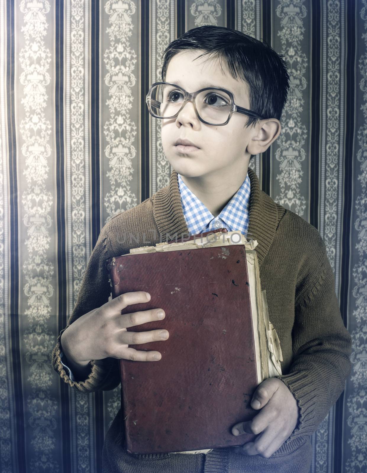Child with red vintage book by deyan_georgiev