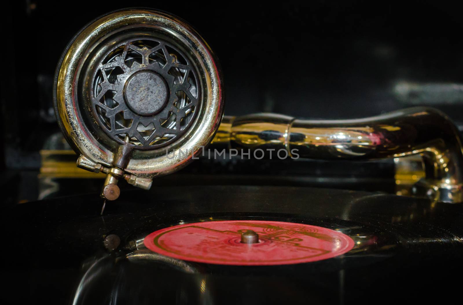fragment of an old gramophone with a vinyl record