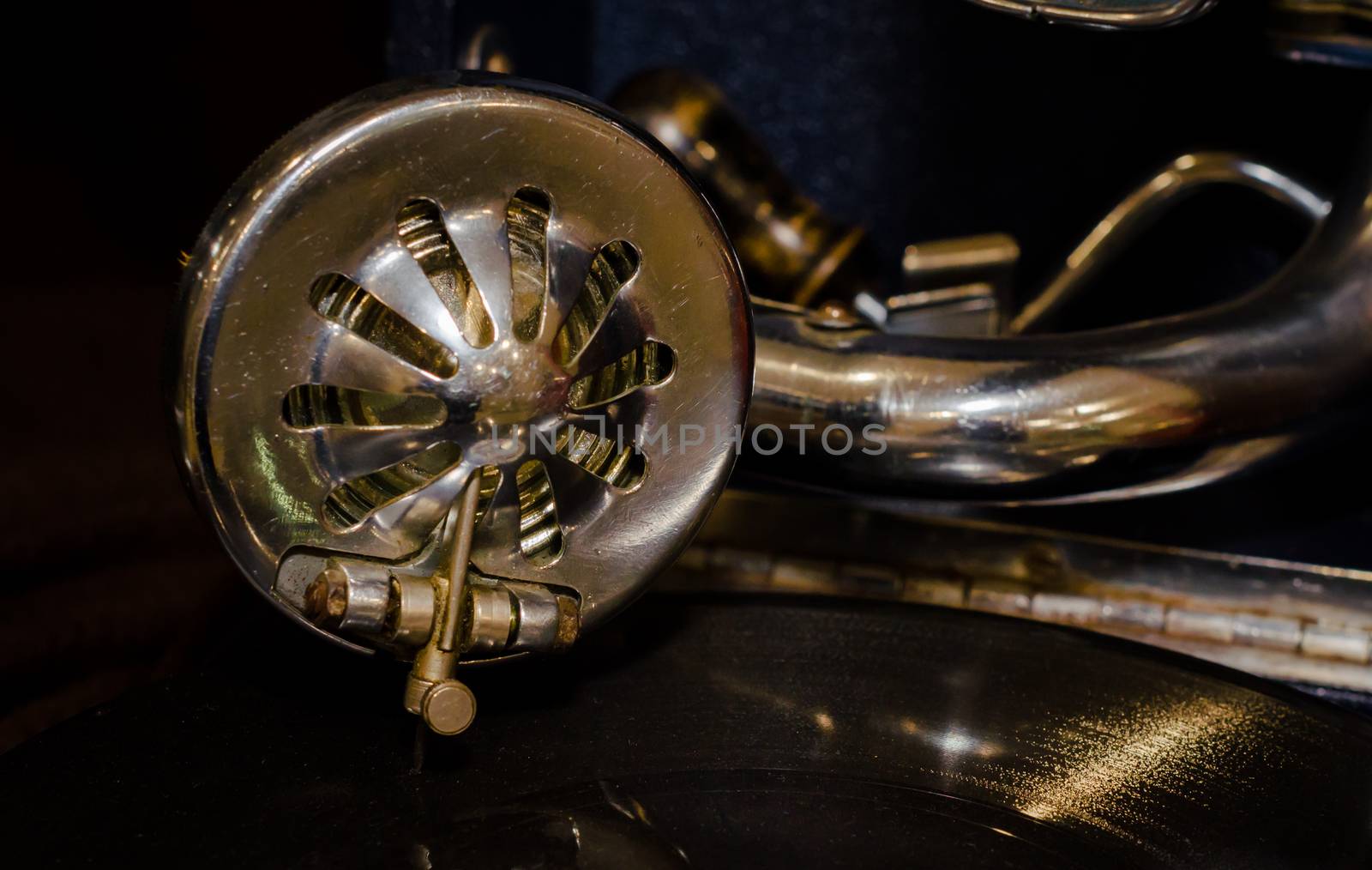 fragment of an old gramophone with a vinyl record