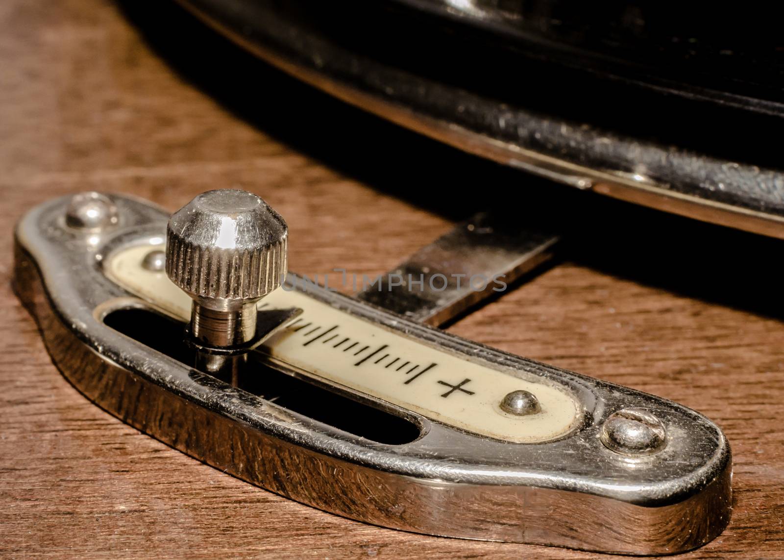 fragment of an old turntable record player 
close-up macro