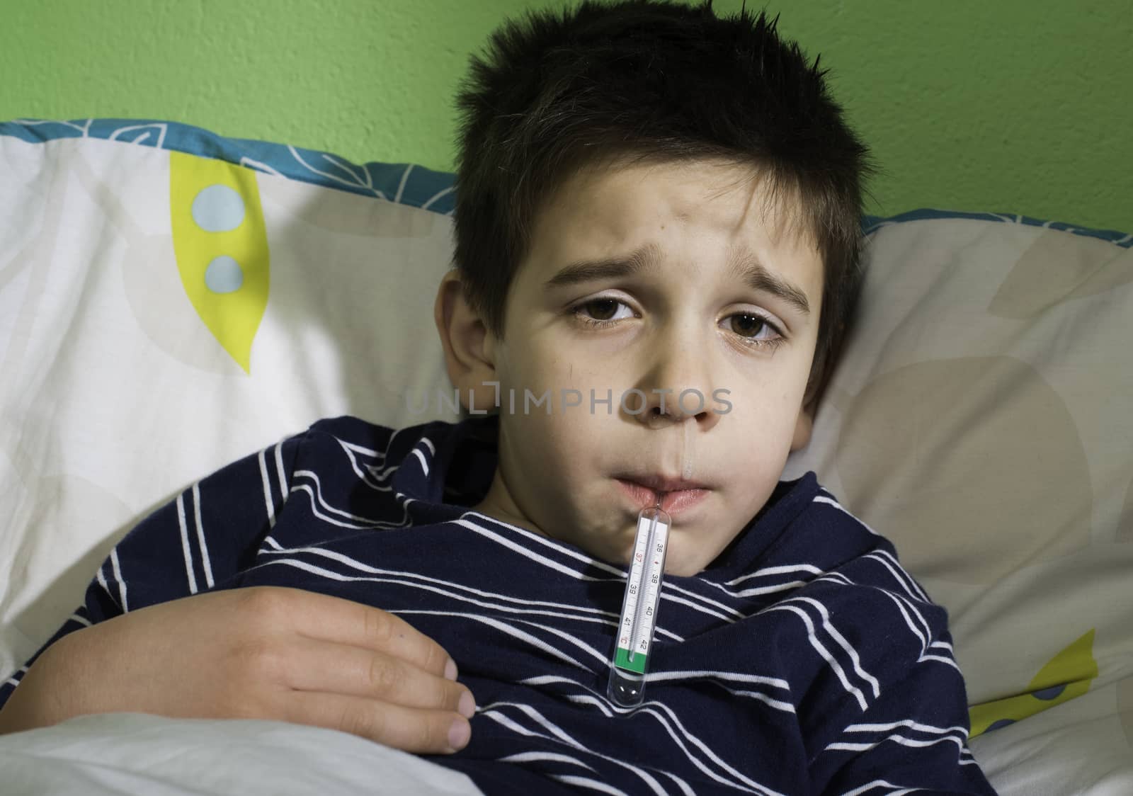 Sick child in bed. by deyan_georgiev