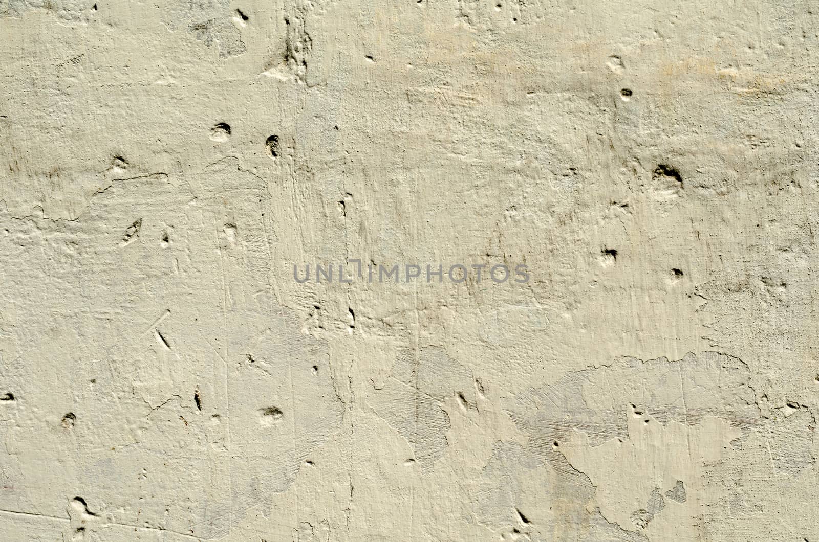 brown texture old concrete wall with remains of paint with damages